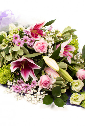 Funeral Flowers In Cellophane With Lily